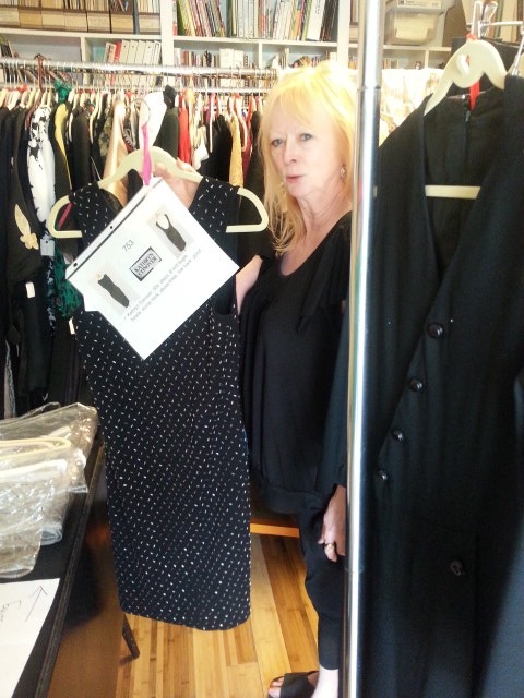 Louise with accession information attached to garment