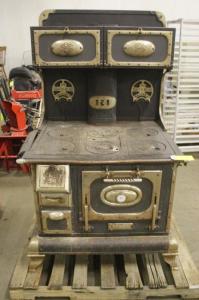 This is what Grandma's stove would have looked like; even this one is not in pristine condition. Courtesy of Auctionflex